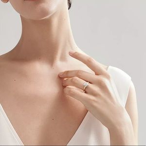 SOLD!! Gorgeous traditional Tiffany solitaire in gold setting engagement ring.